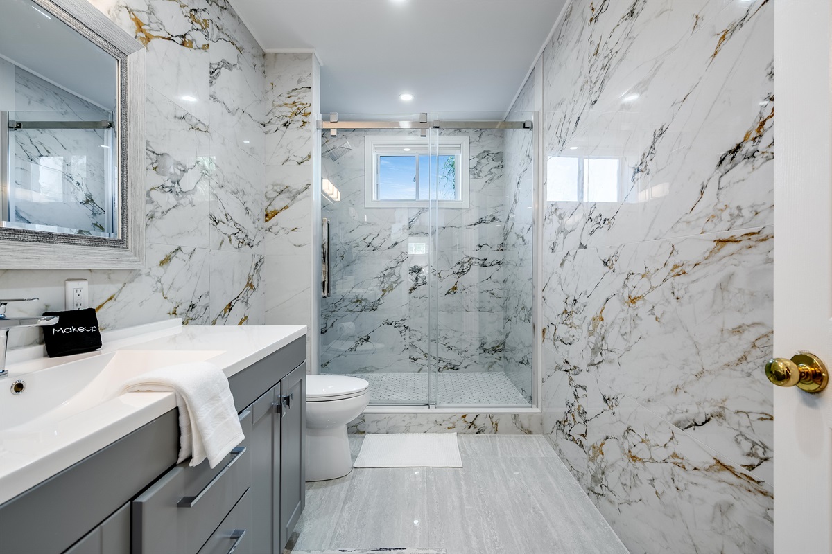 A bathroom where glamour meets calm.
