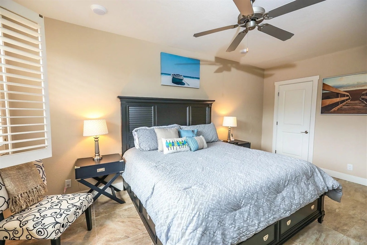 King bed and ceiling fan for comfort.