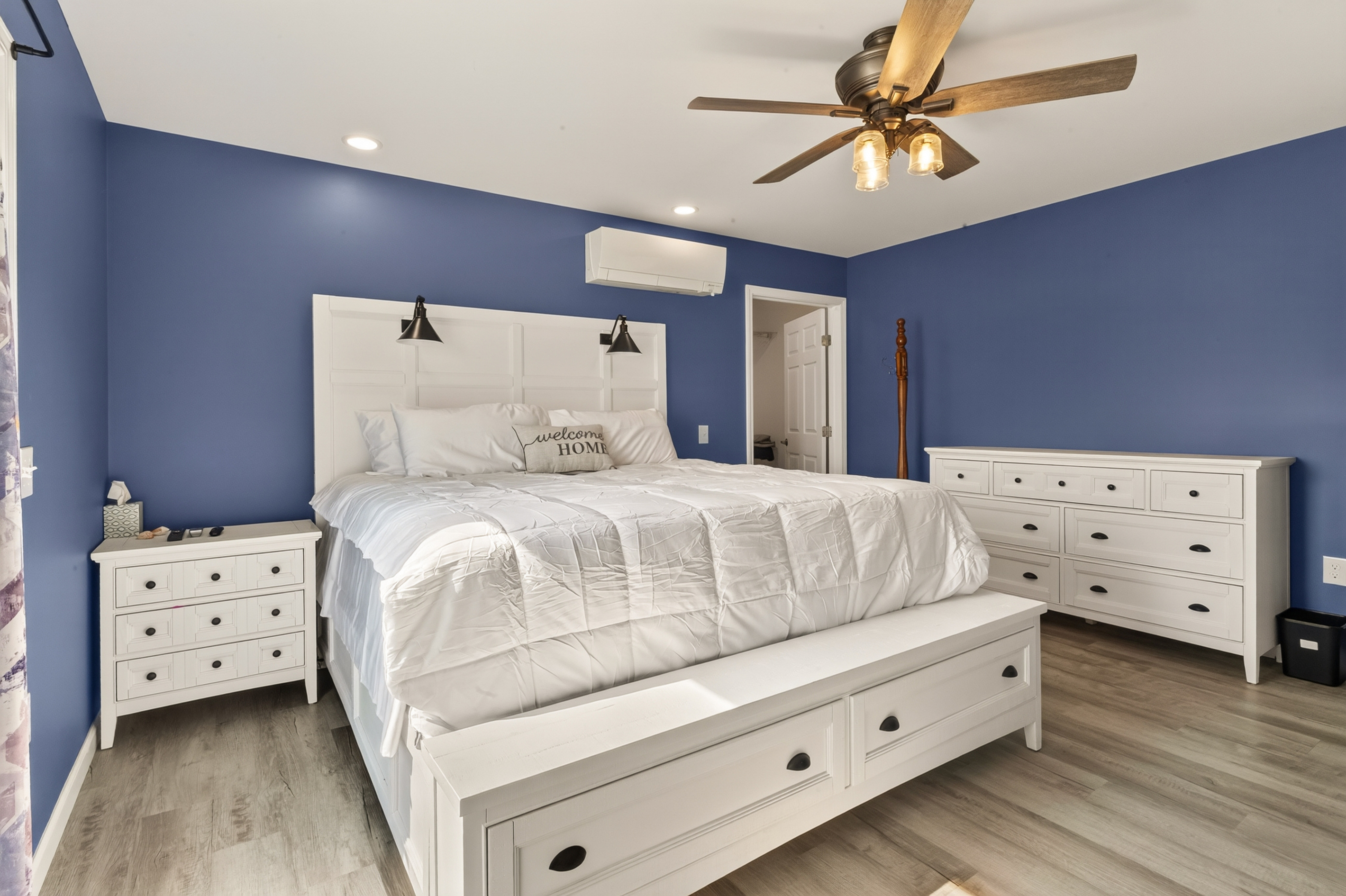 Blue bedroom with twin daybed and dresser