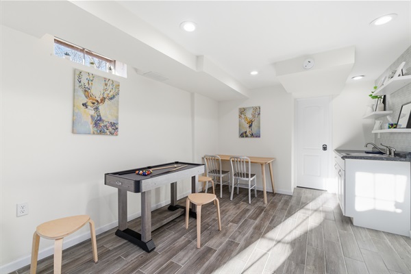 Lower level with Smart TV, PlayStation 5, foosball, mini pool table