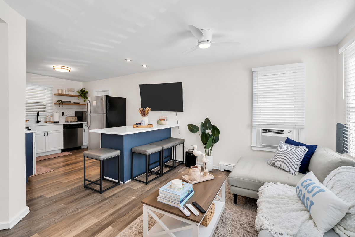Cook, chat, and lounge without ever leaving the conversation. The open layout keeps everyone together from the island to the couch all day long.