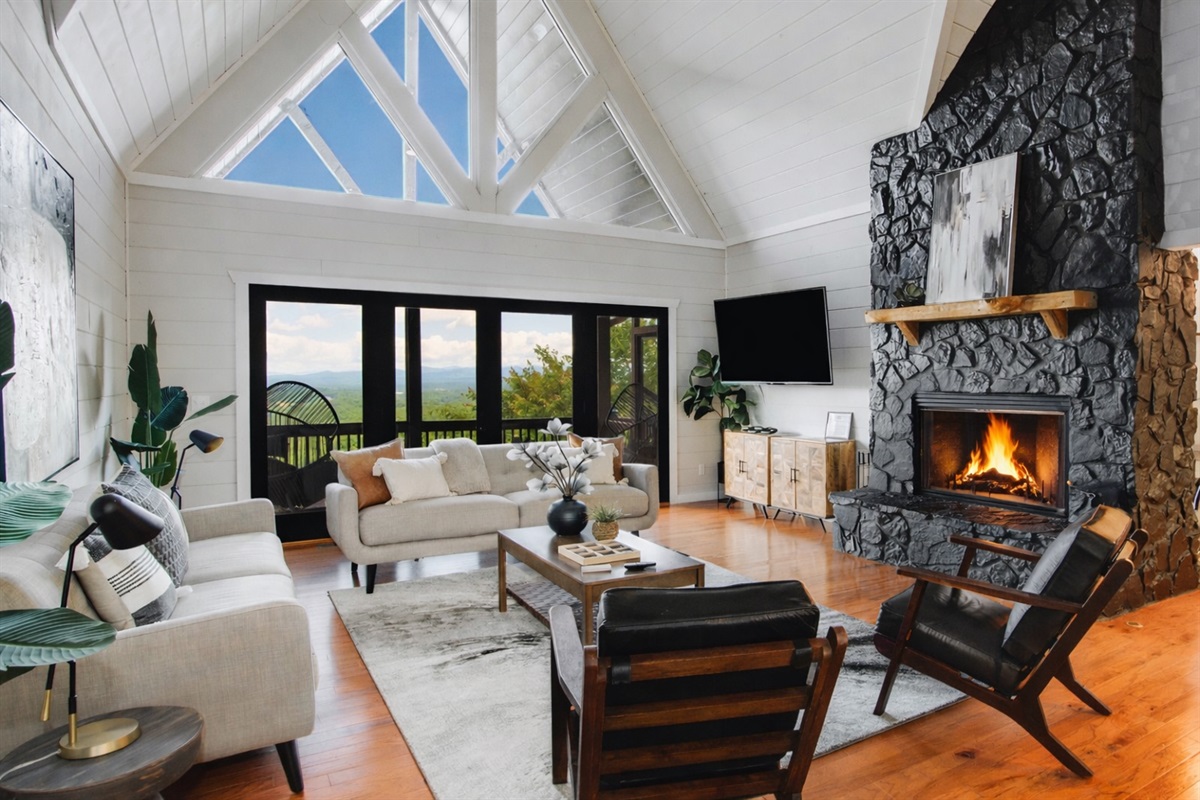 Modern comfort meets mountain charm&mdash;enjoy floor-to-ceiling views, designer interiors, and a warm fireplace that makes every evening unforgettable.
*Indoor Fireplace (Seasonal Use October - April)