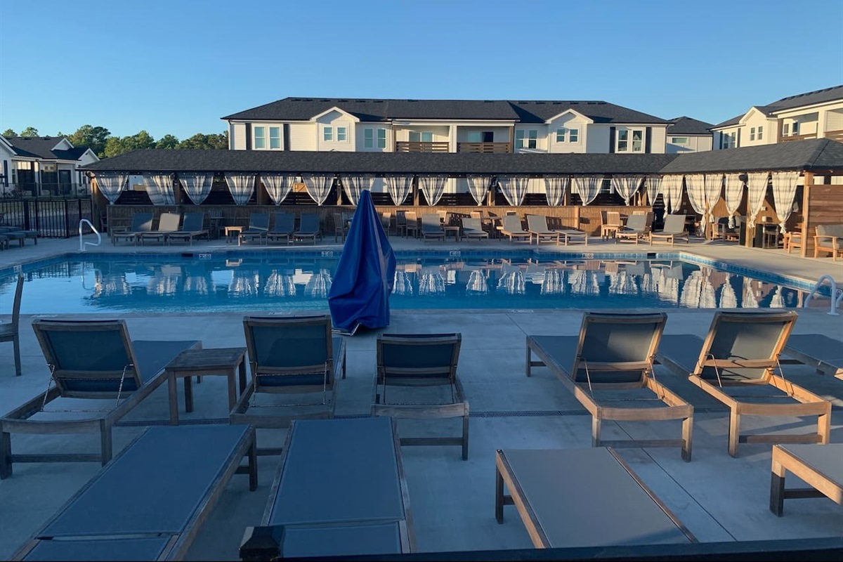 Amazing large saltwater pool with plenty of sun loungers for you and your family.