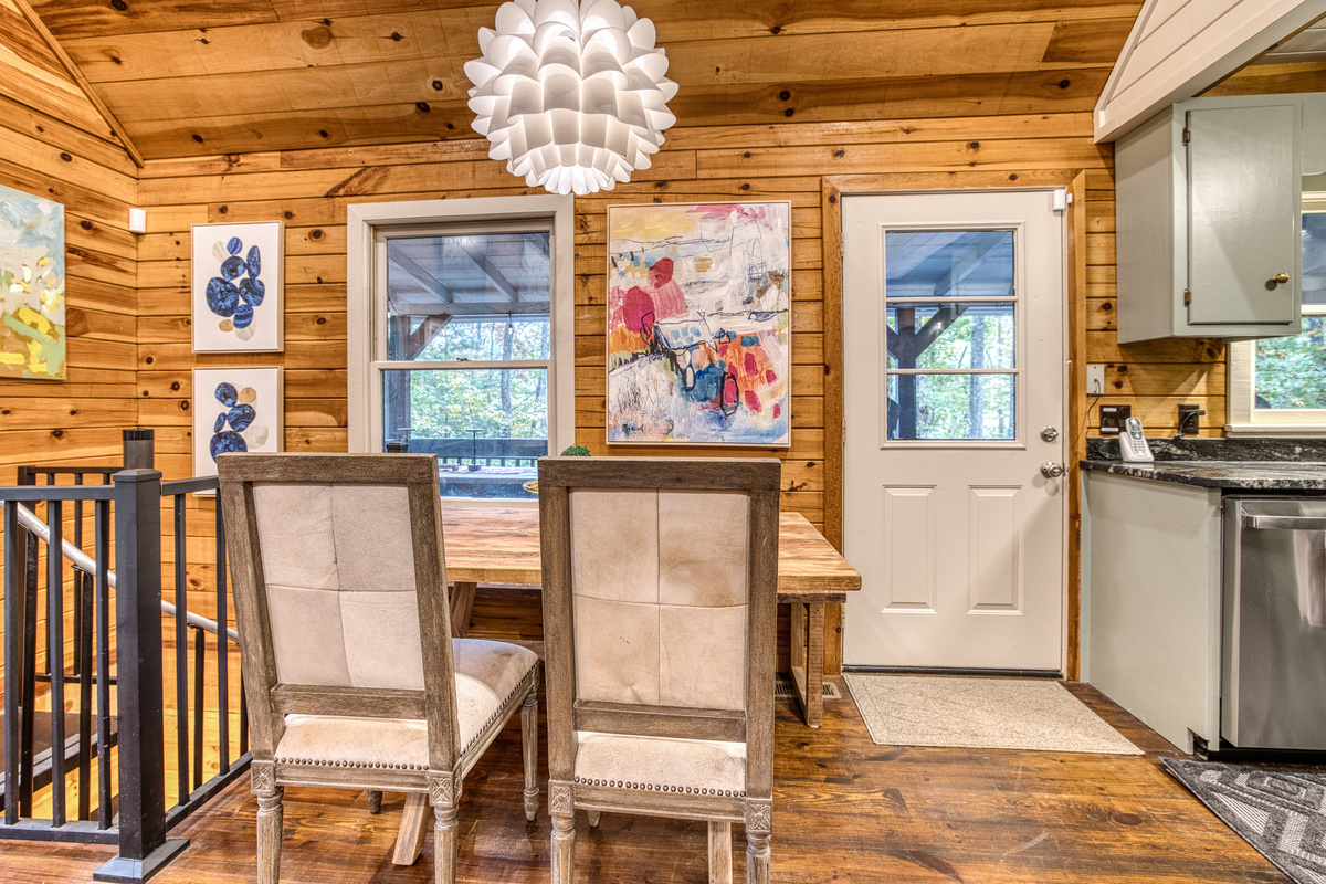 Dining area with a pendant light.