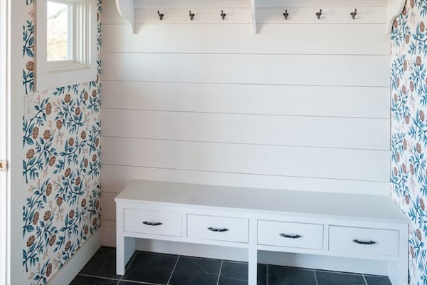 Mudroom entryway--a place for Carolina red-muddy boots and shoes.