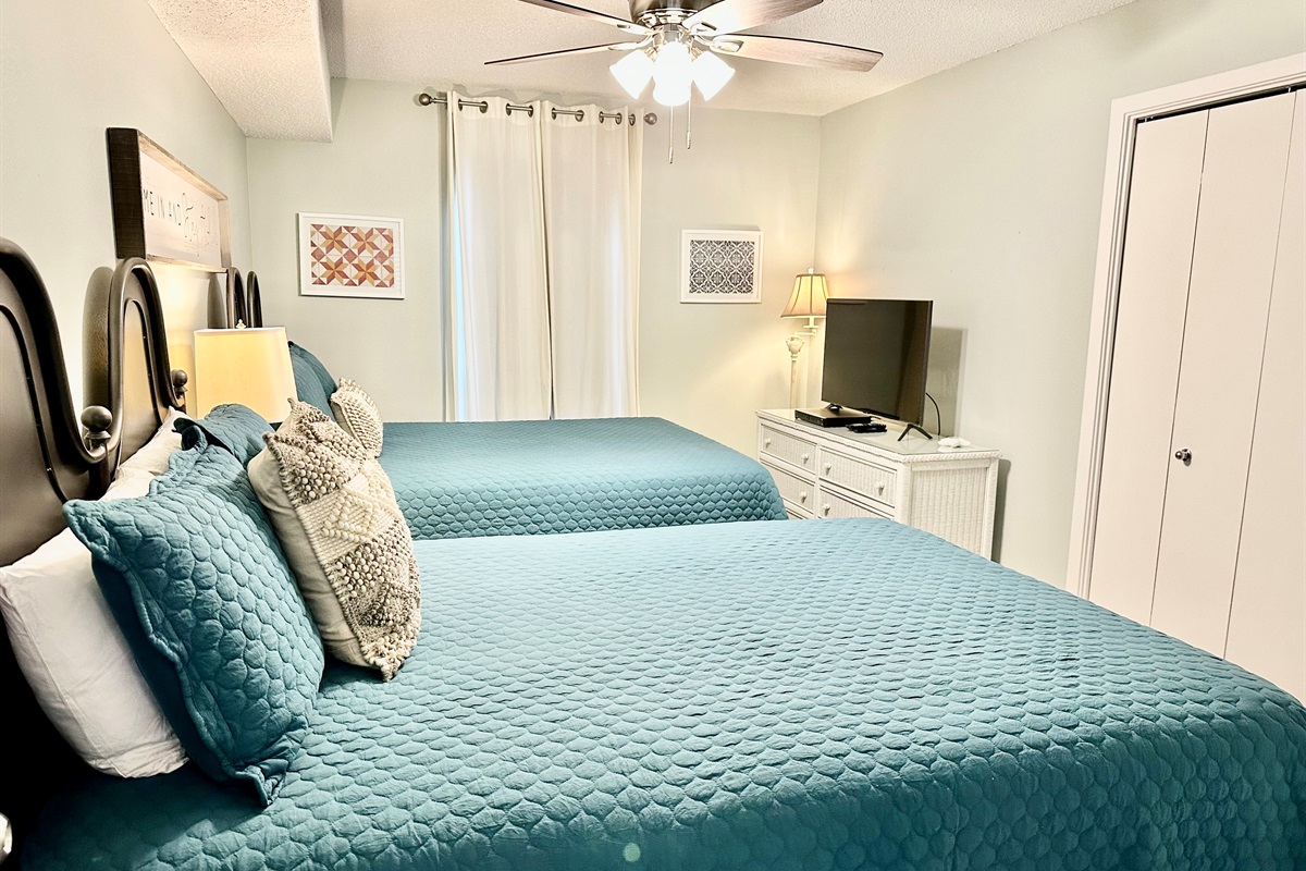 Spacious guest bedroom with 2 queen beds...