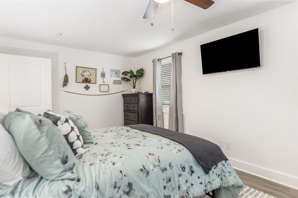 Guest bedroom #1- dresser and smart TV