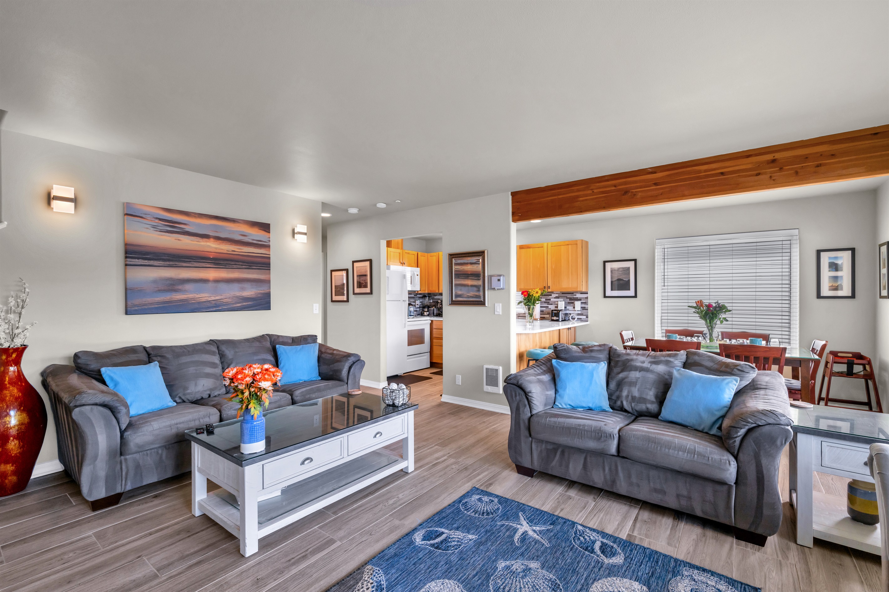 Curl up in the living room with to the ambiance of the fireplace and 60" SmartTV/cable