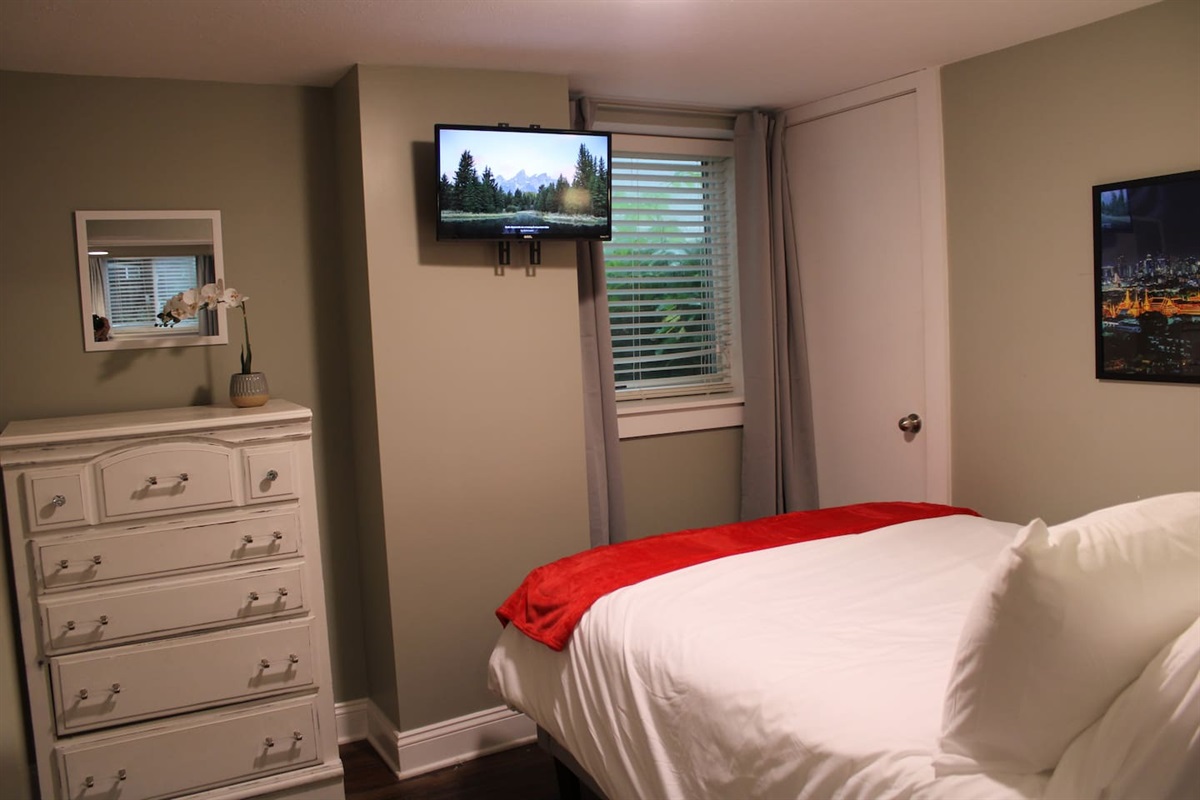 Enjoy the Roku smart TV while relaxing in the Garden Level Bangkok Room.