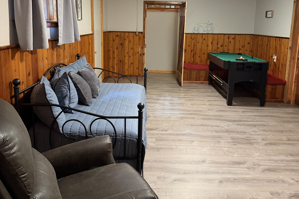 Lower level game area with mini pool table