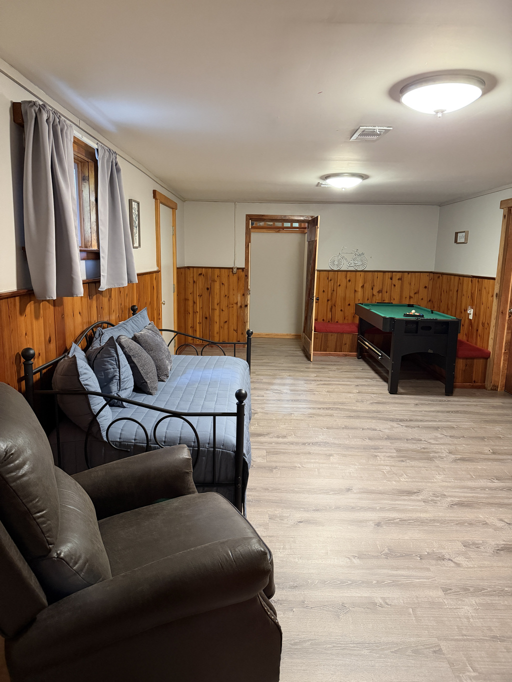 Lower level game area with mini pool table