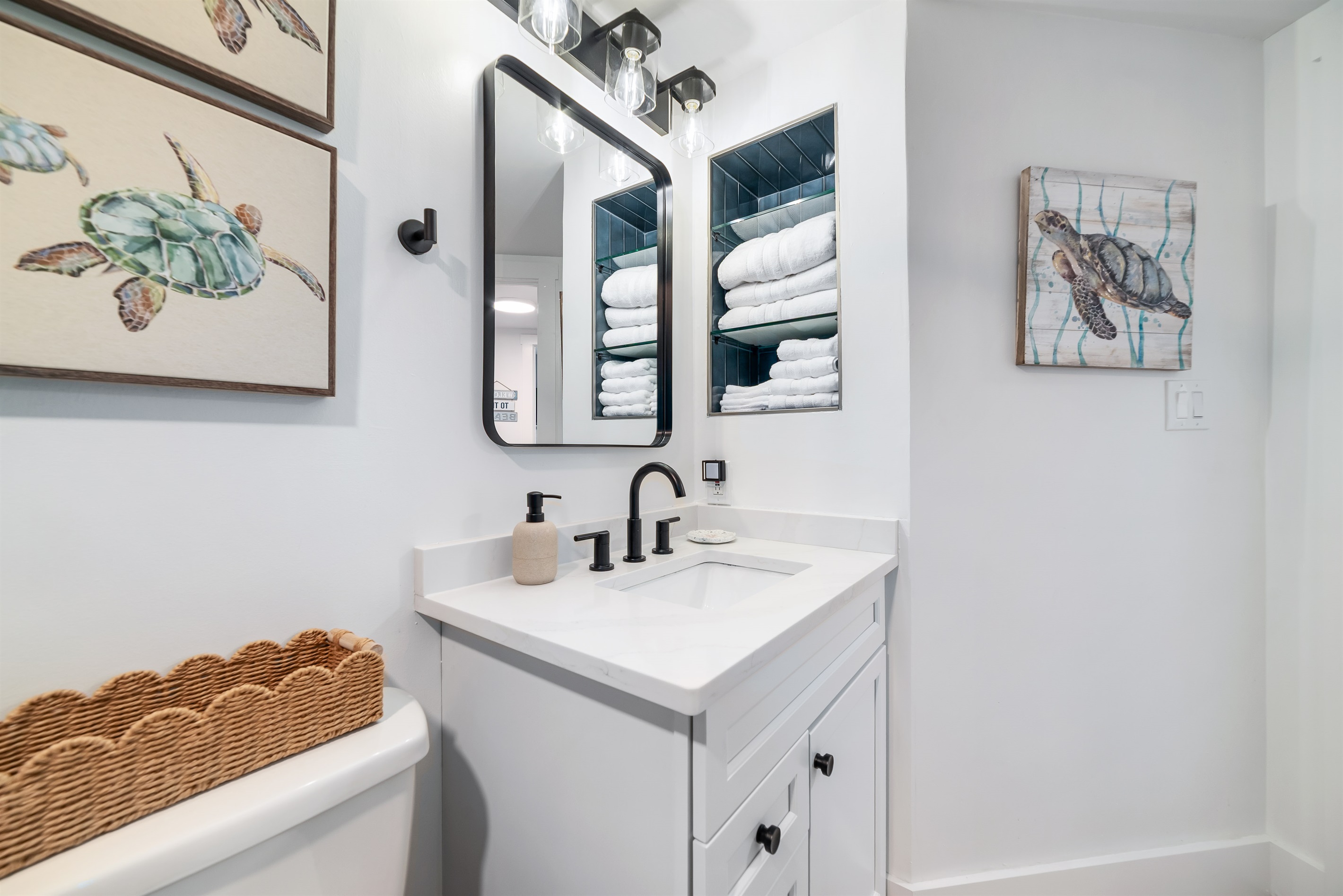 Guest Bathroom with niche for toiletry bags