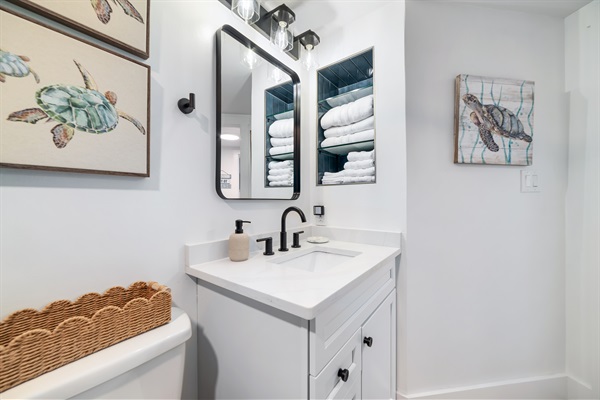 Guest Bathroom with niche for toiletry bags
