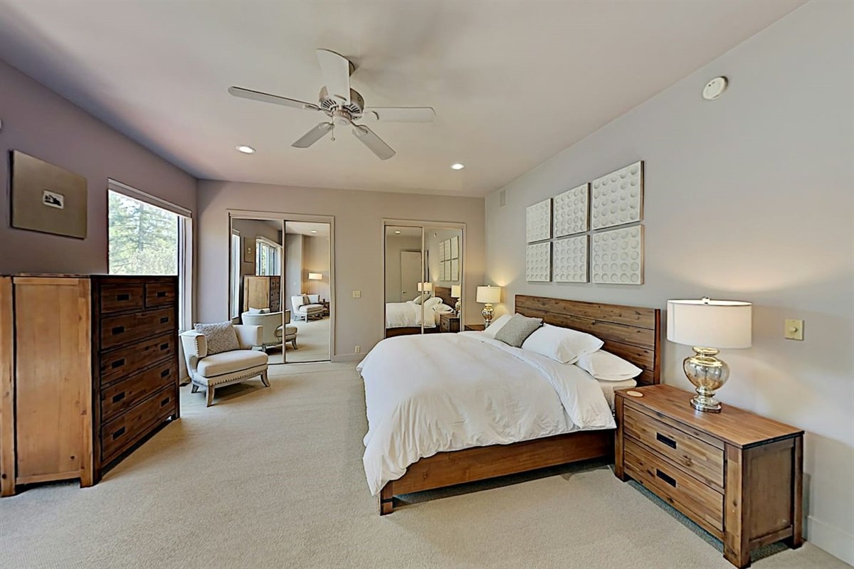 King-size bed, ensuite bathroom (tub and shower combo), and direct deck access to hot tub.