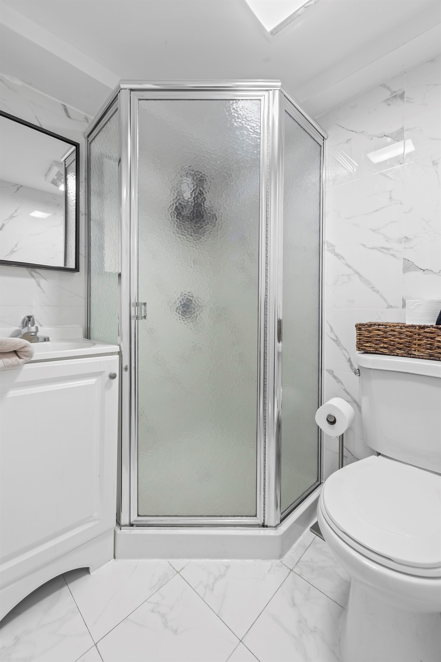 Refresh and recharge in the sleek glass shower where spa like finishes elevate everyday routines.
