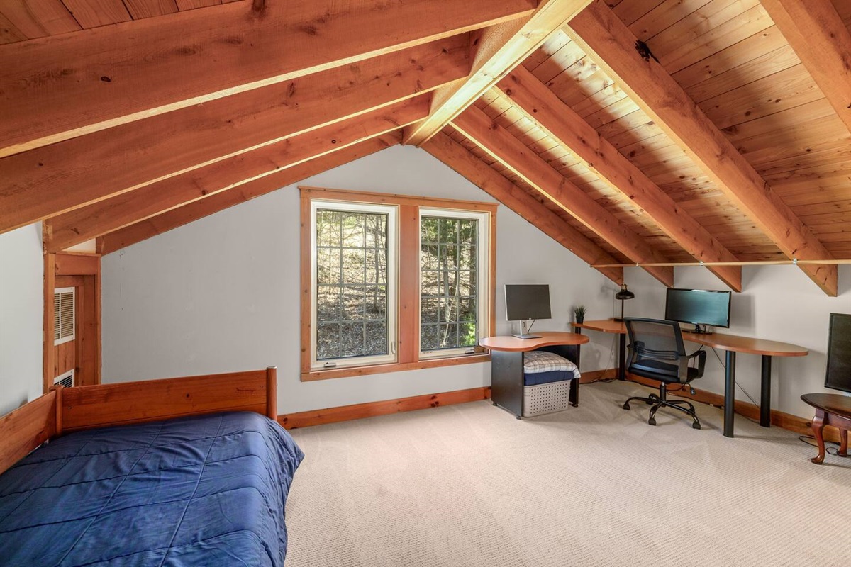 Loft space with two twin beds (trundle), dedicated workspace with extra monitor, and Amazon Fire Stick with Hulu Live TV, ESPN+, and Disney+