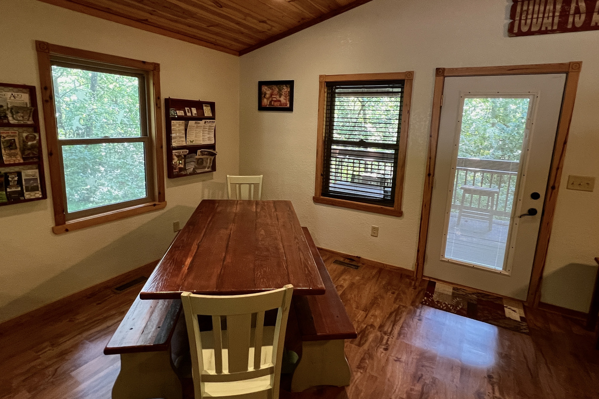 Dining area trestle table seats 8 comfortably