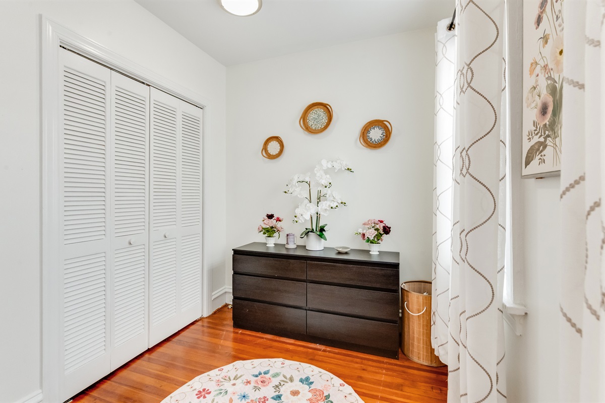 Dressing Room Delight: Stylish storage meets floral charm in this inviting retreat!