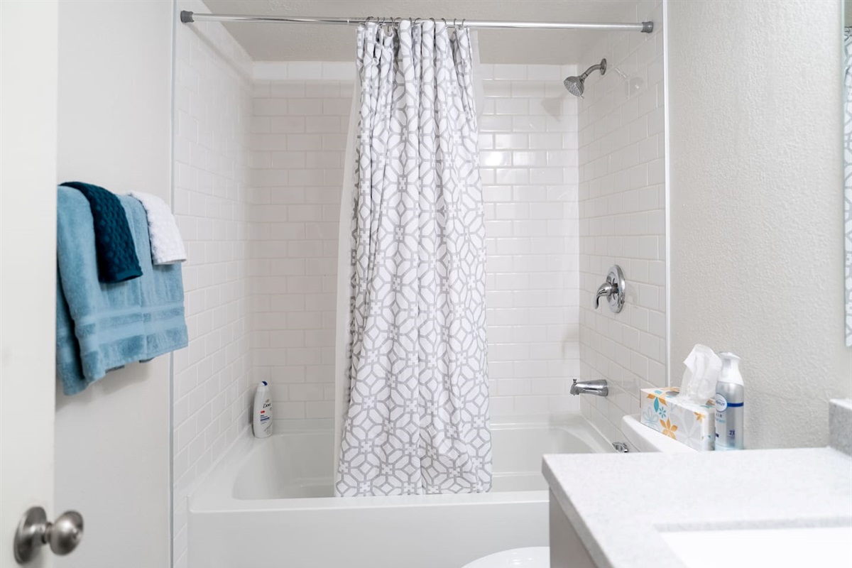 Lower level Bathroom with tiled tub/shower! 