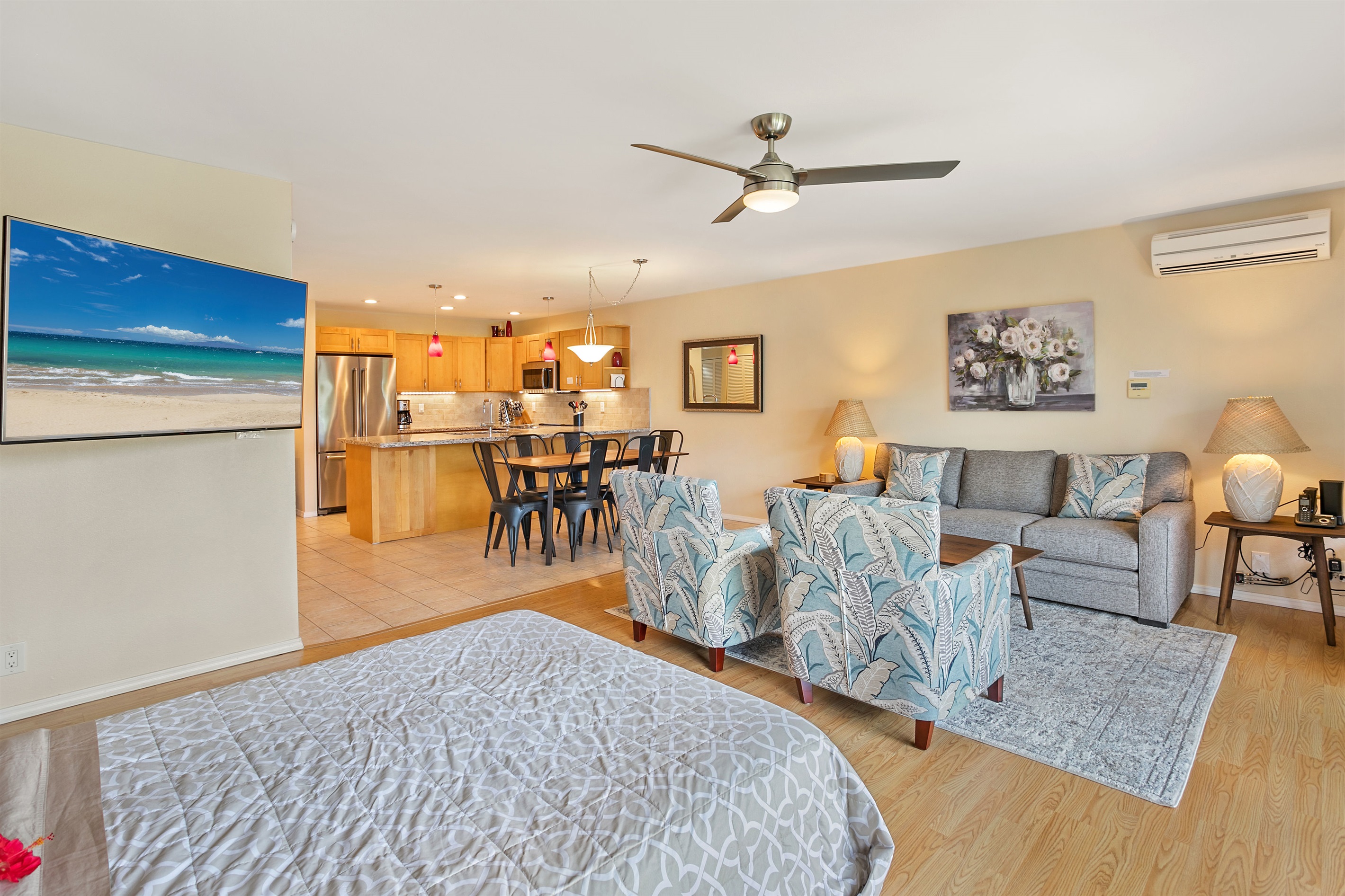 Even with the Murphy bed down, this is a spacious living room. TV, A/C, kitchen