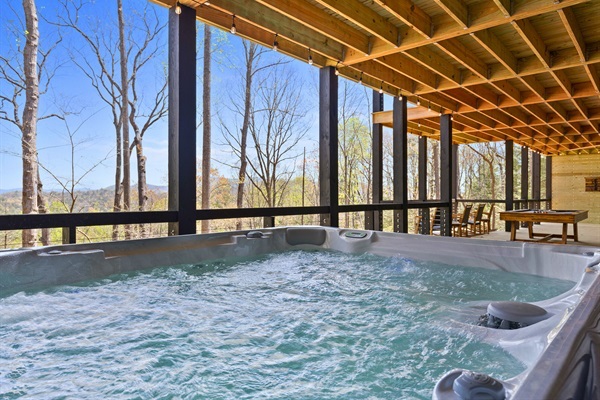 Unwind in the bubbles of the hot tub, where the warmth is only matched by the surrounding cool mountain vistas.