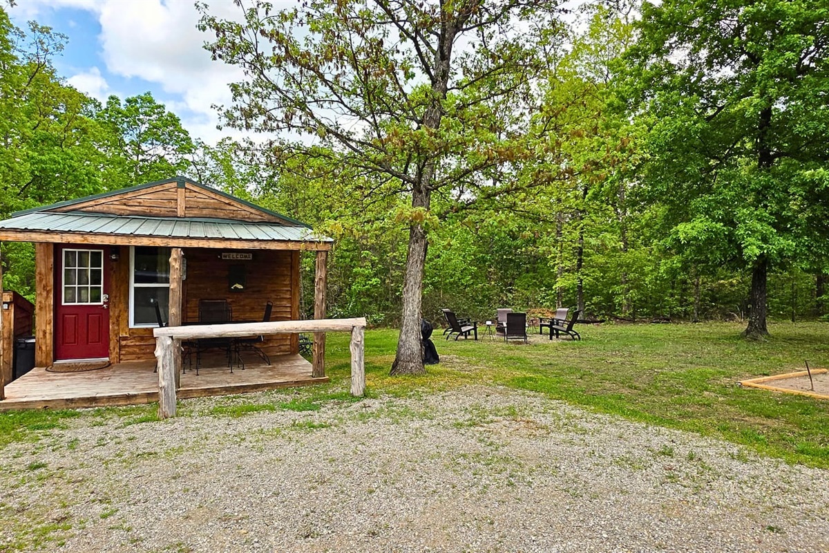 A private getaway where porch sitting, firepit gatherings, and a game of horseshoes are all part of the experience. 