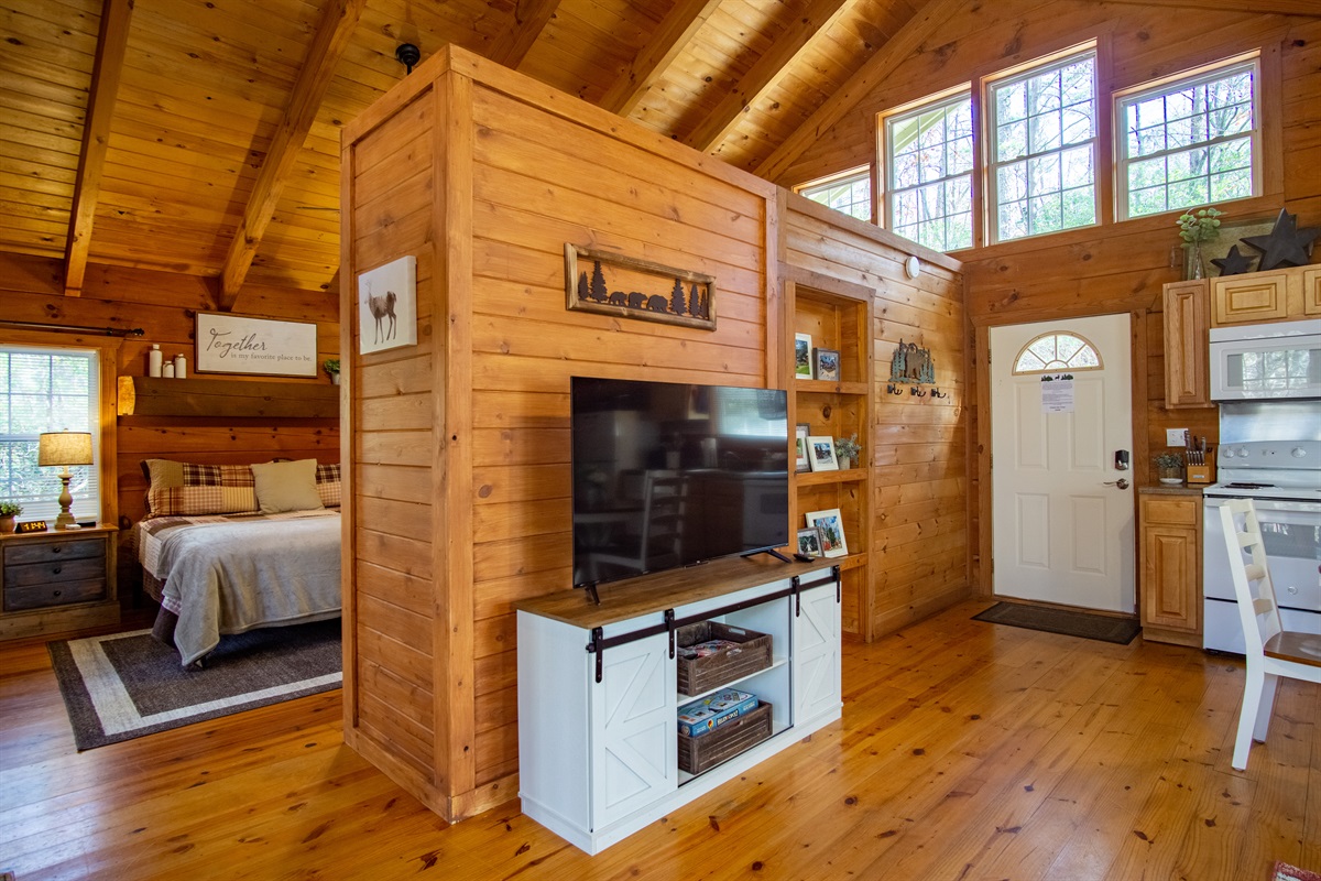 Cozy living room with fireplace and Smart TV for a relaxing night in.