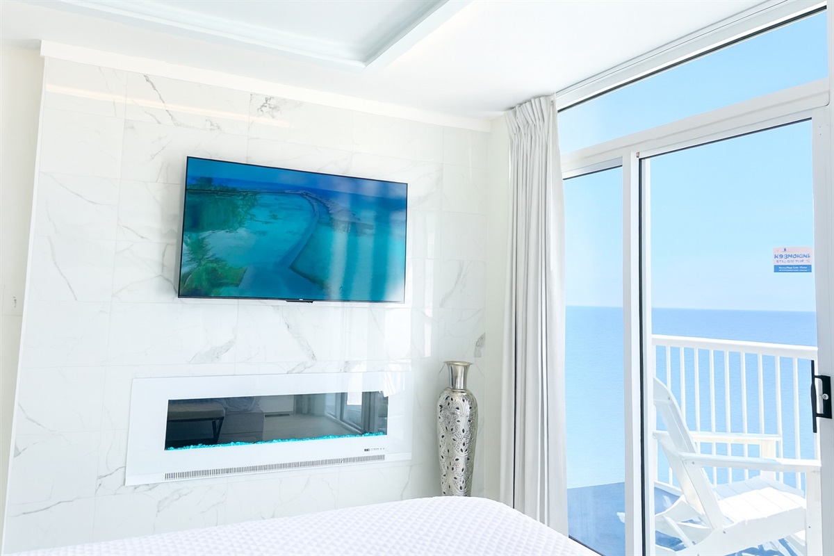 Watch TV and the ocean from bed.