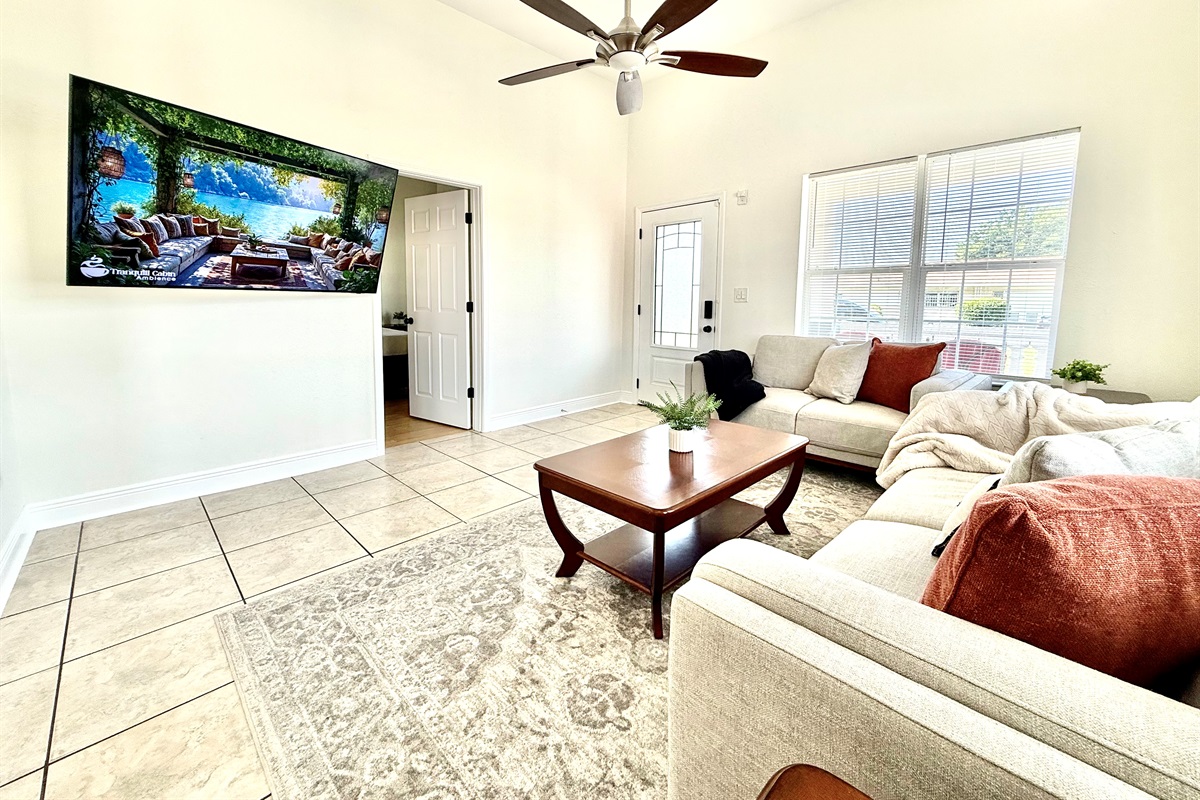 Modern neutral tones, warm tile flooring, and thoughtfully curated accents make this space as Instagram-worthy as it is inviting.