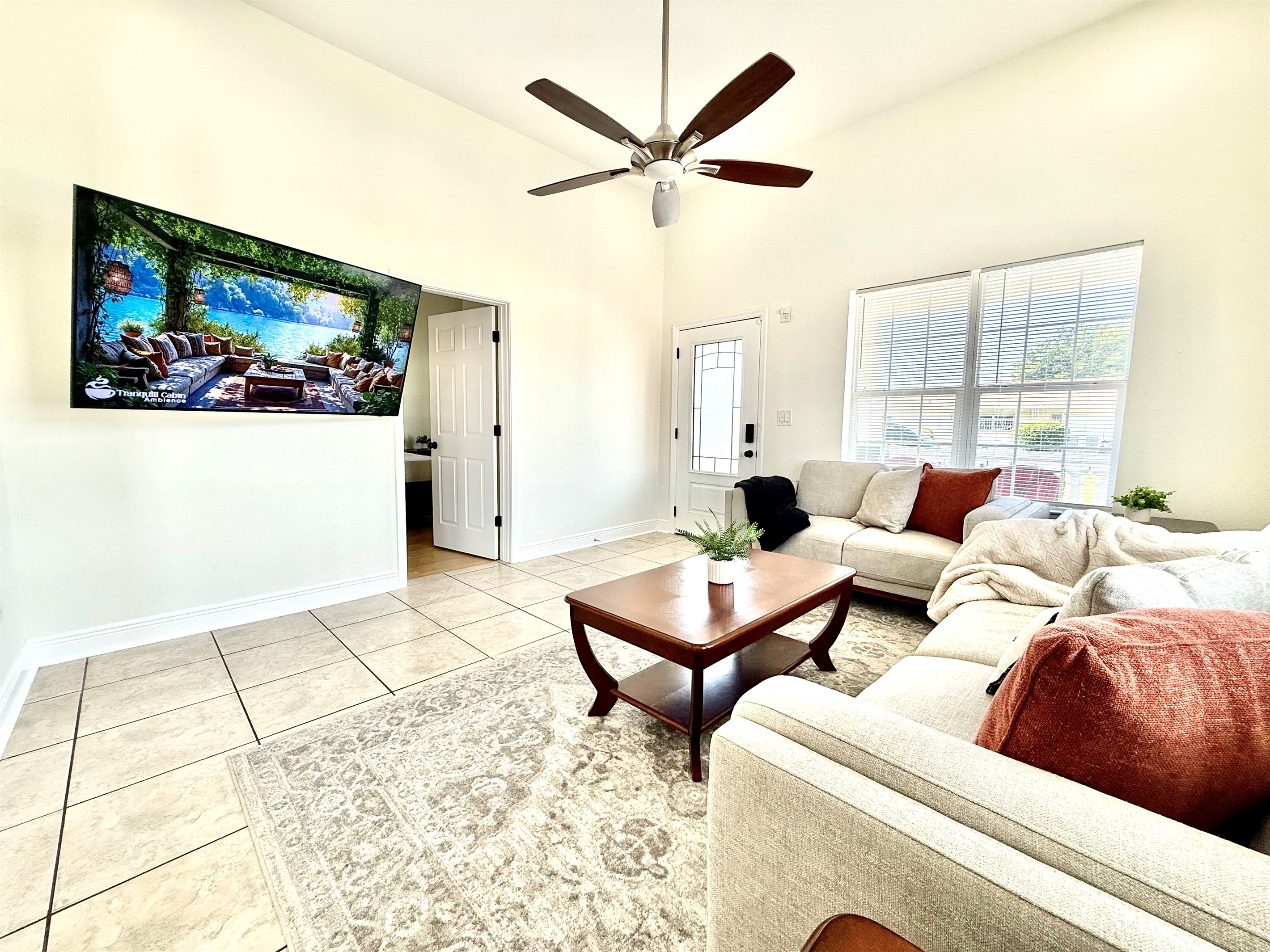 Modern neutral tones, warm tile flooring, and thoughtfully curated accents make this space as Instagram-worthy as it is inviting.