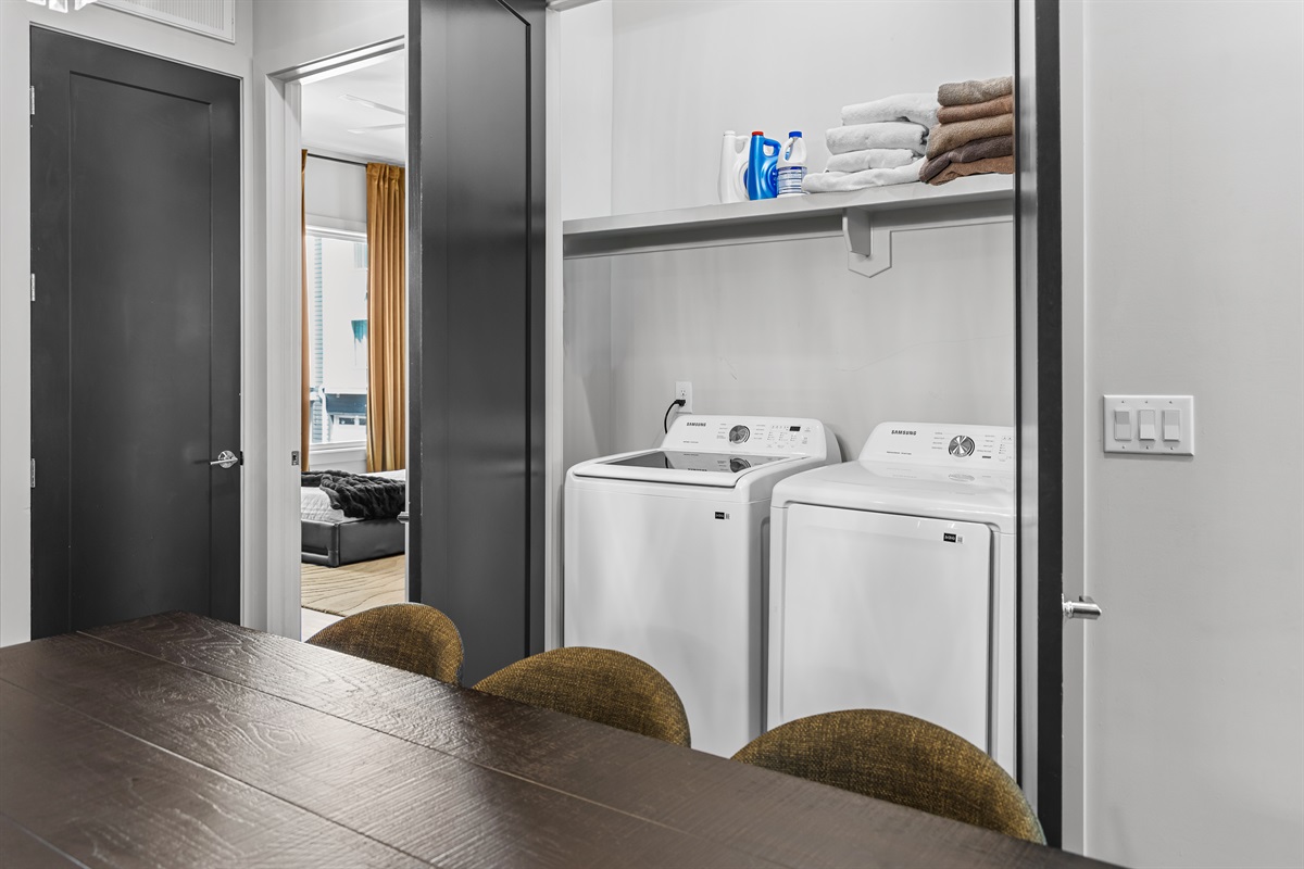 Dining Room: Gather around the stylish table with chic chairs for unforgettable meals and memories!