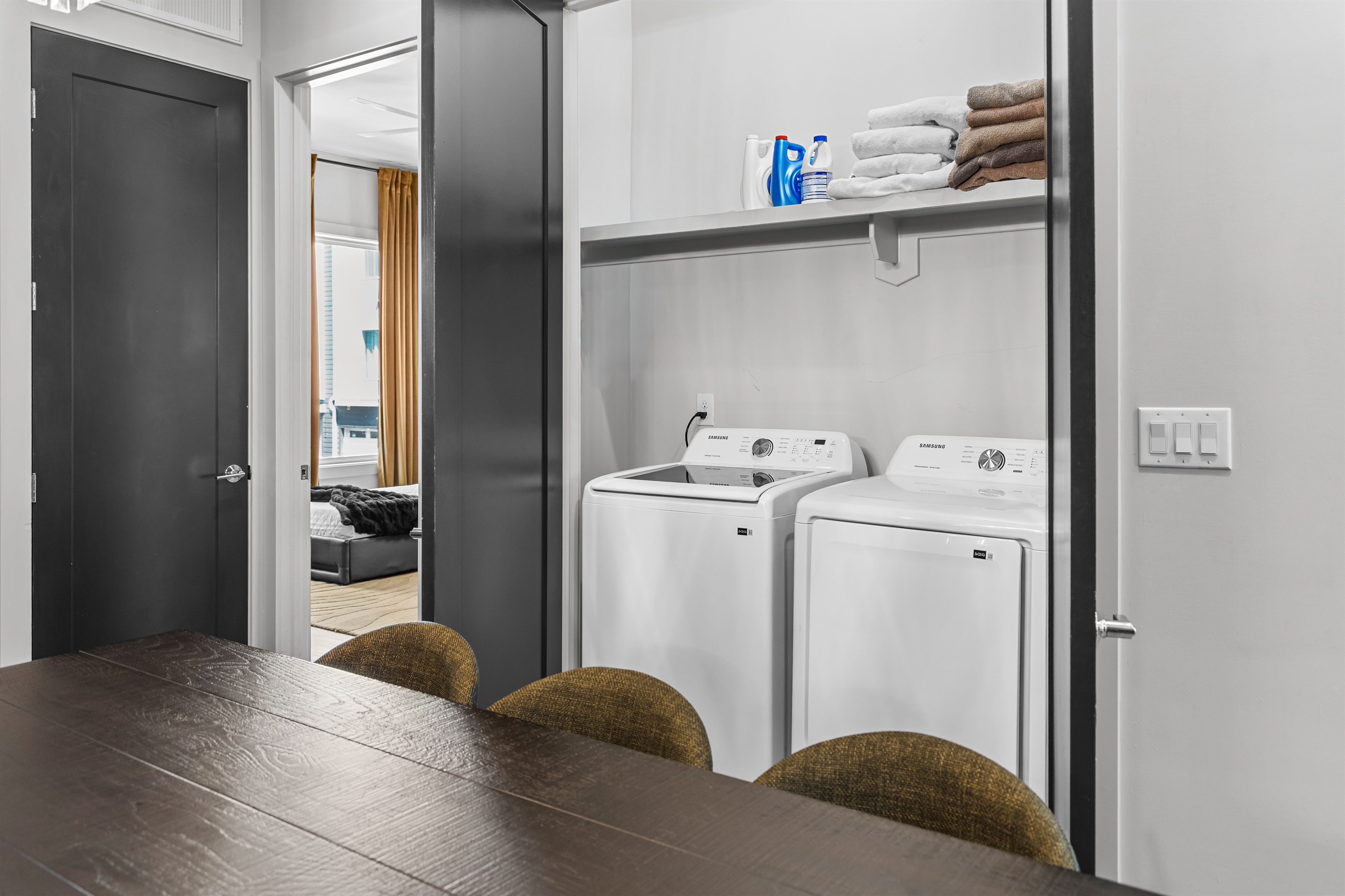 Dining Room: Gather around the stylish table with chic chairs for unforgettable meals and memories!