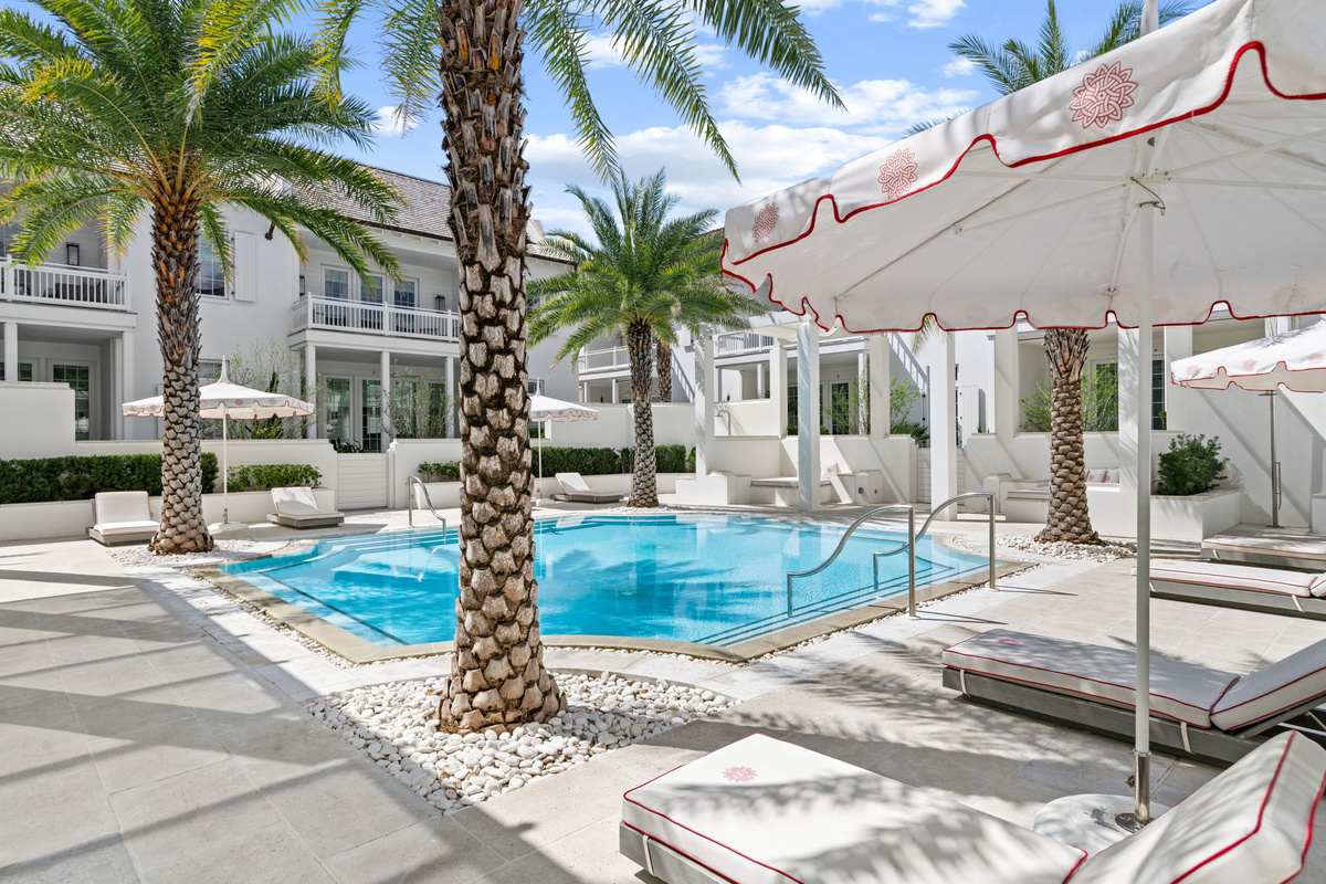 Relax on comfortable pool loungers, just steps from the front porch.