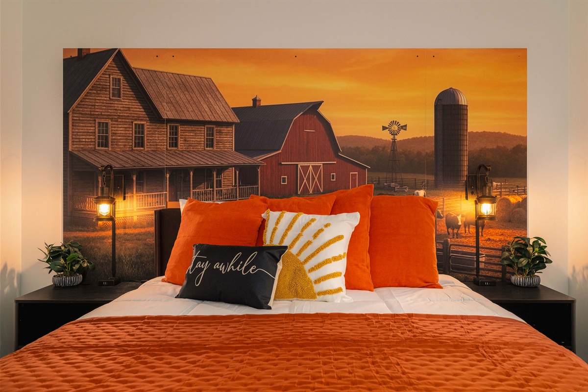 Sunset Farmhouse Bedroom — warm golden tones, rustic barn mural, and plush bedding for a cozy night’s sleep.