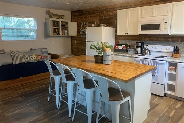 Kitchen with dining island.