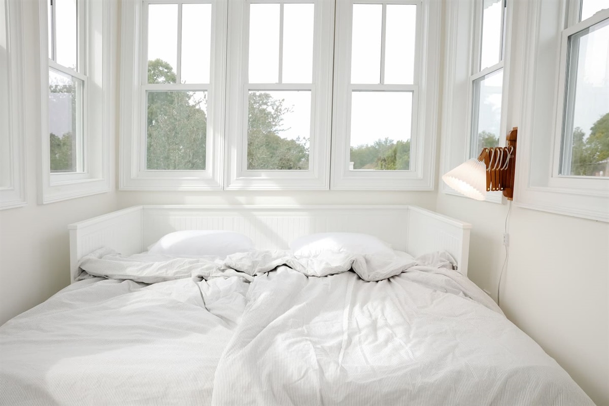 The lookout is surrounded by windows for views of the historic downtown neighborhood. The day bed pulls out into two twin mattresses. 