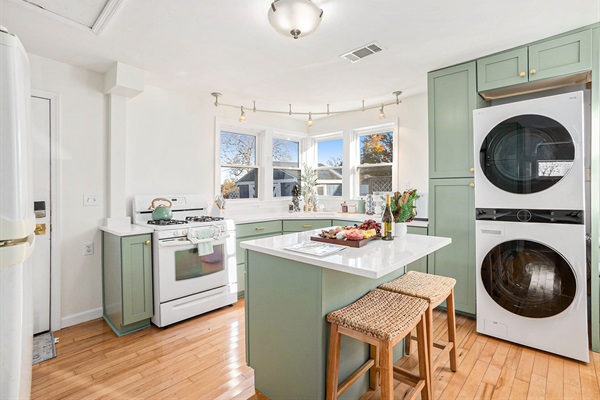 Enjoy lake views through large kitchen windows while you cook or sip coffee