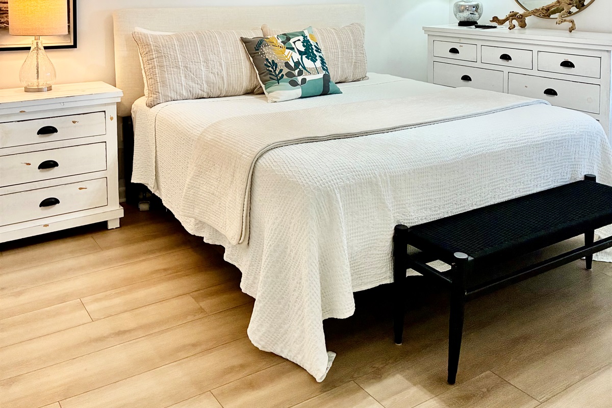 What a beautiful bedroom to enjoy after a day at the beach!  