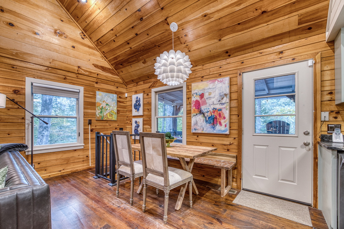 Dining area with an exterior door.