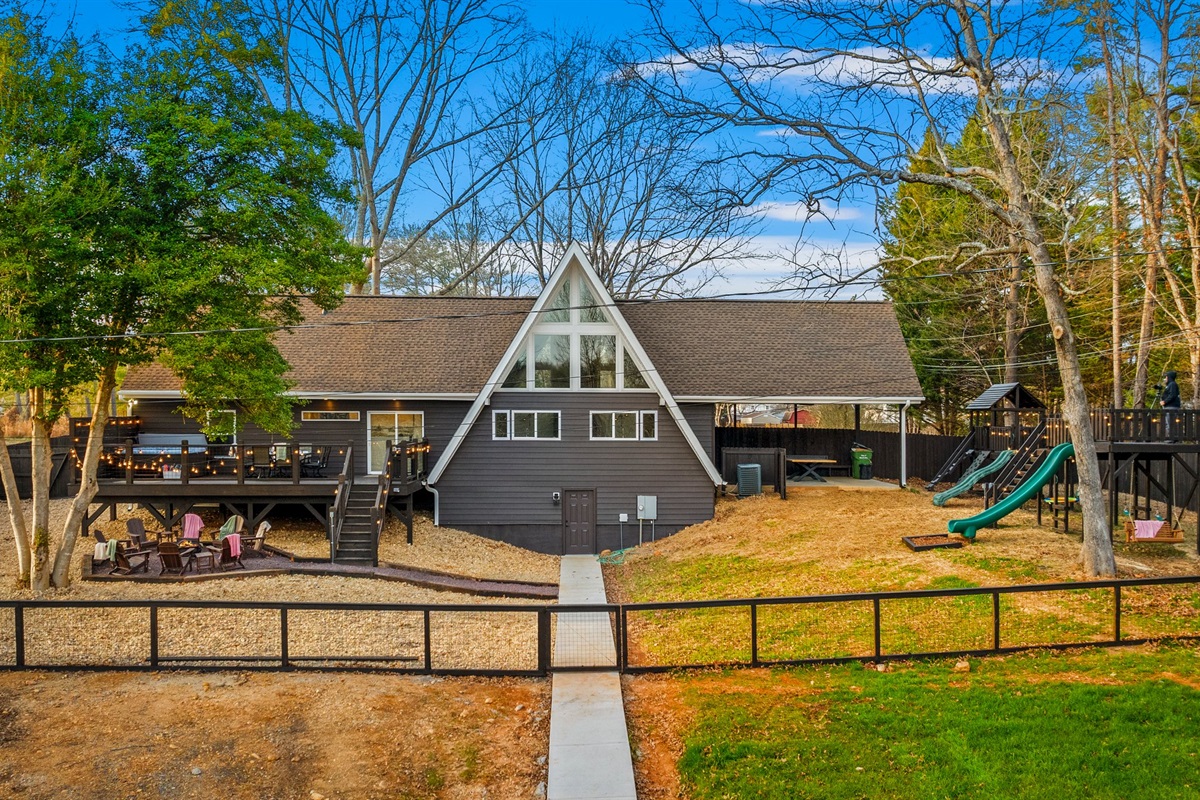 The fully fenced backyard keeps children and dogs safely contained. Families love the peace of mind paired with upscale outdoor amenities.
