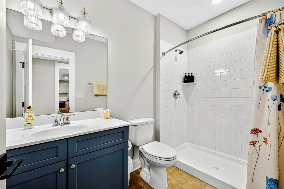 Of course, the hydrangea king suite has an adorable en-suite full bath also with a floral pattern also done in soothing blues and grays. Every detail is well thought out at Blueberry Bay.