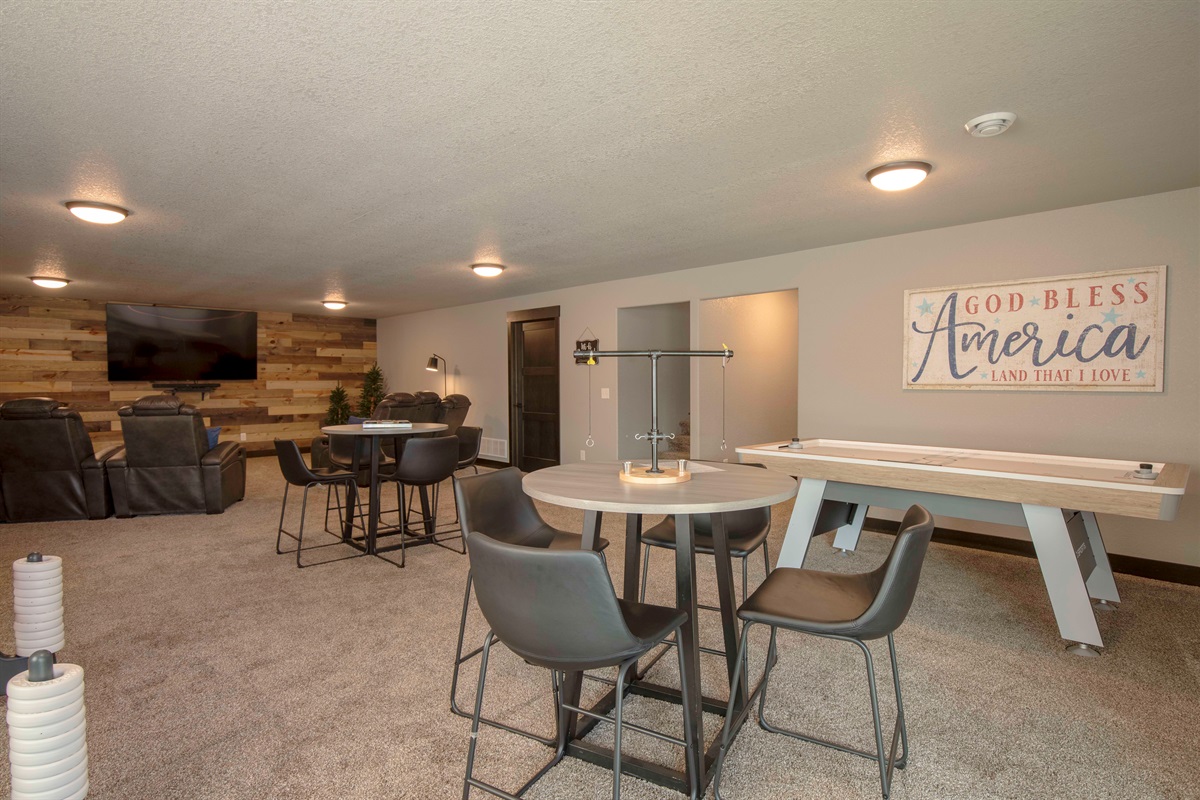 Challenge your crew to a game of air hockey or unwind with board games and snacks at the nearby table—this game room is made for fun and friendly competition.