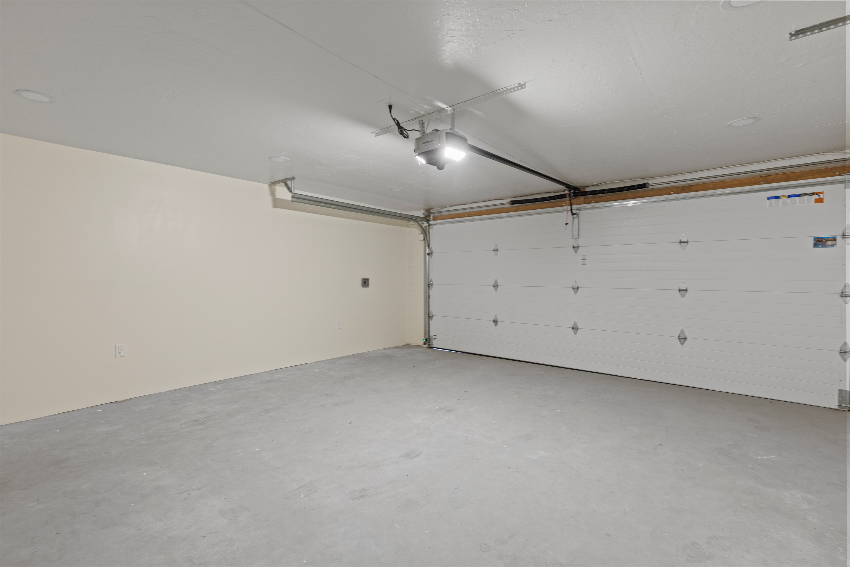 In garage parking. Level 2 EV plug can be made available upon request