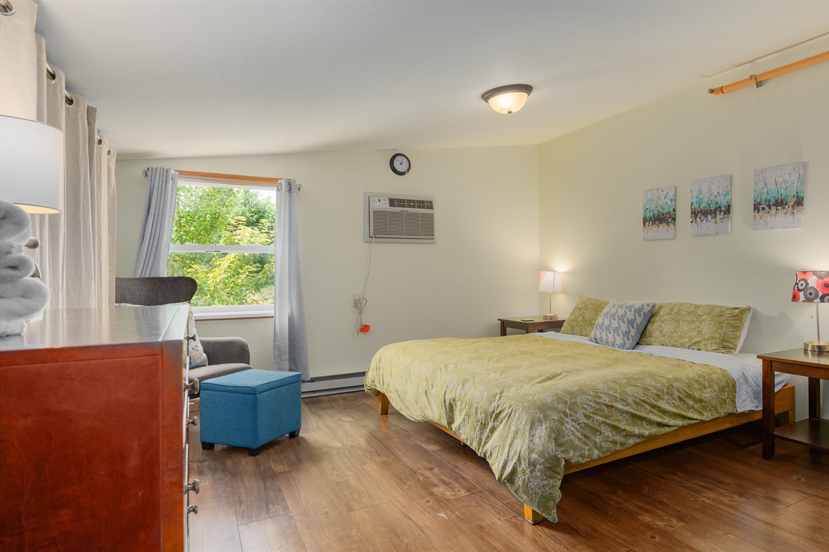 Eclipse's upper bedroom has a comfortable king bed and lounge area.