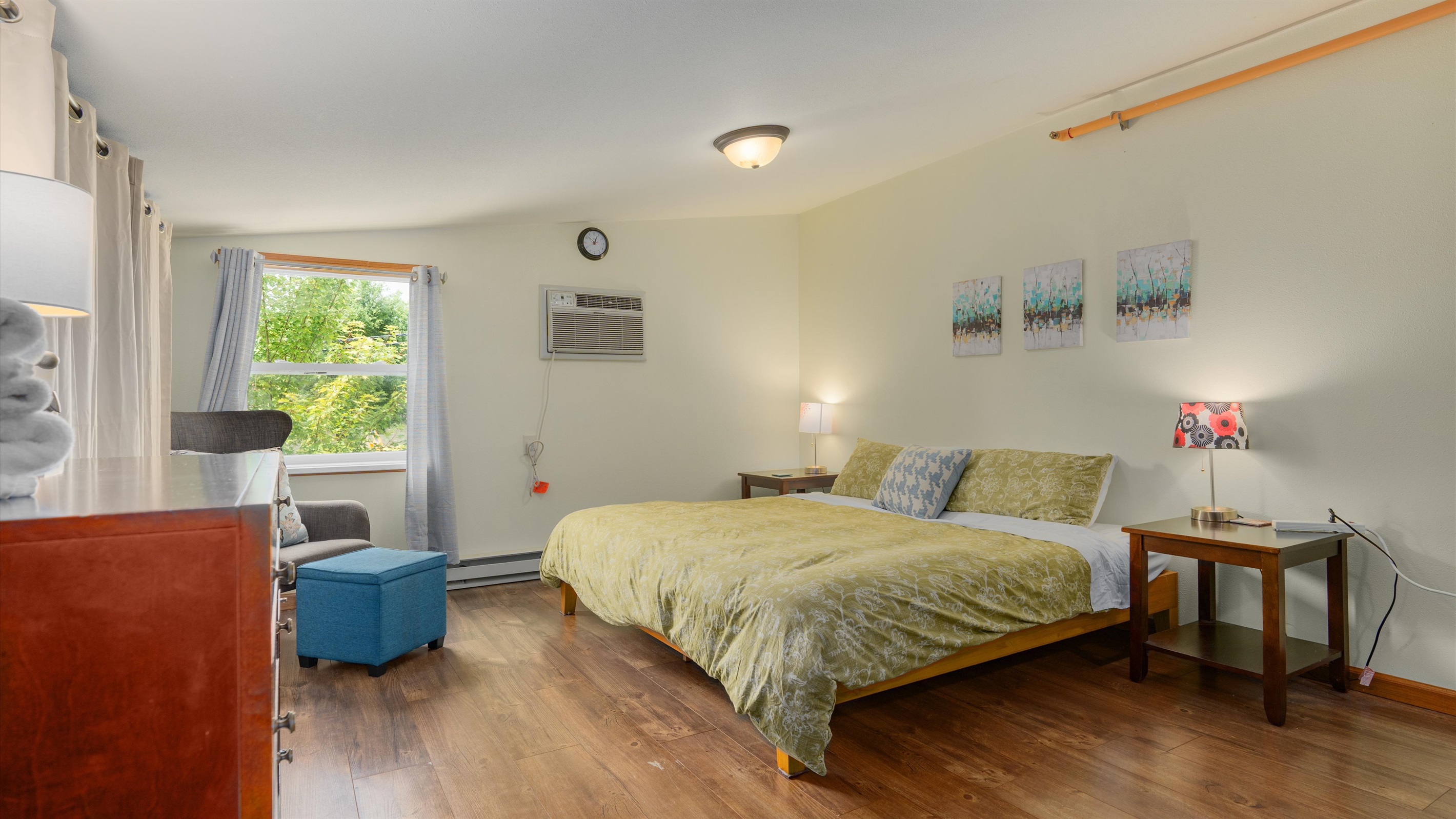 Eclipse's upper bedroom has a comfortable king bed and lounge area.
