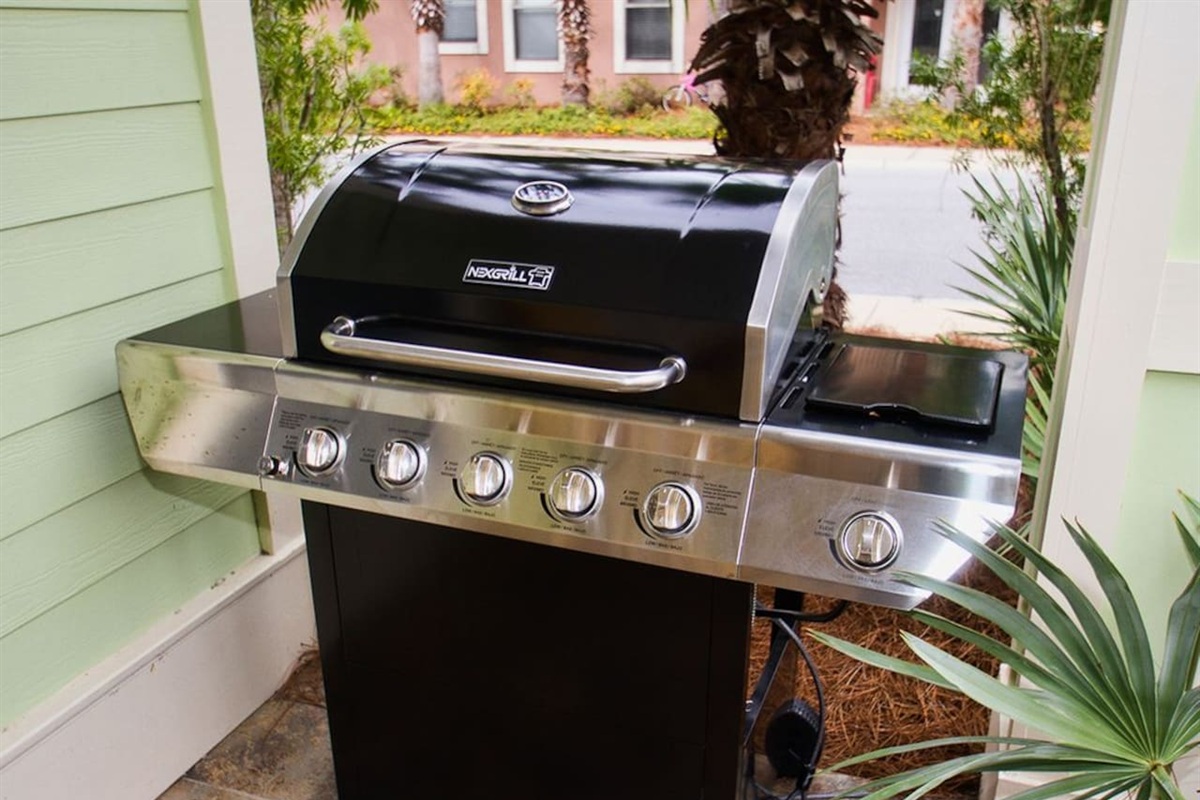 Private covered BBQ grill, complete with propane gas for hassle-free outdoor cooking.