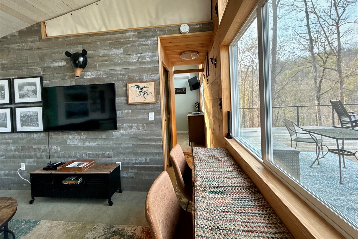 Breakfast, remote work, or game night- this cozy two-seater overlooks the mountains, making every moment feel intentional and inspired.