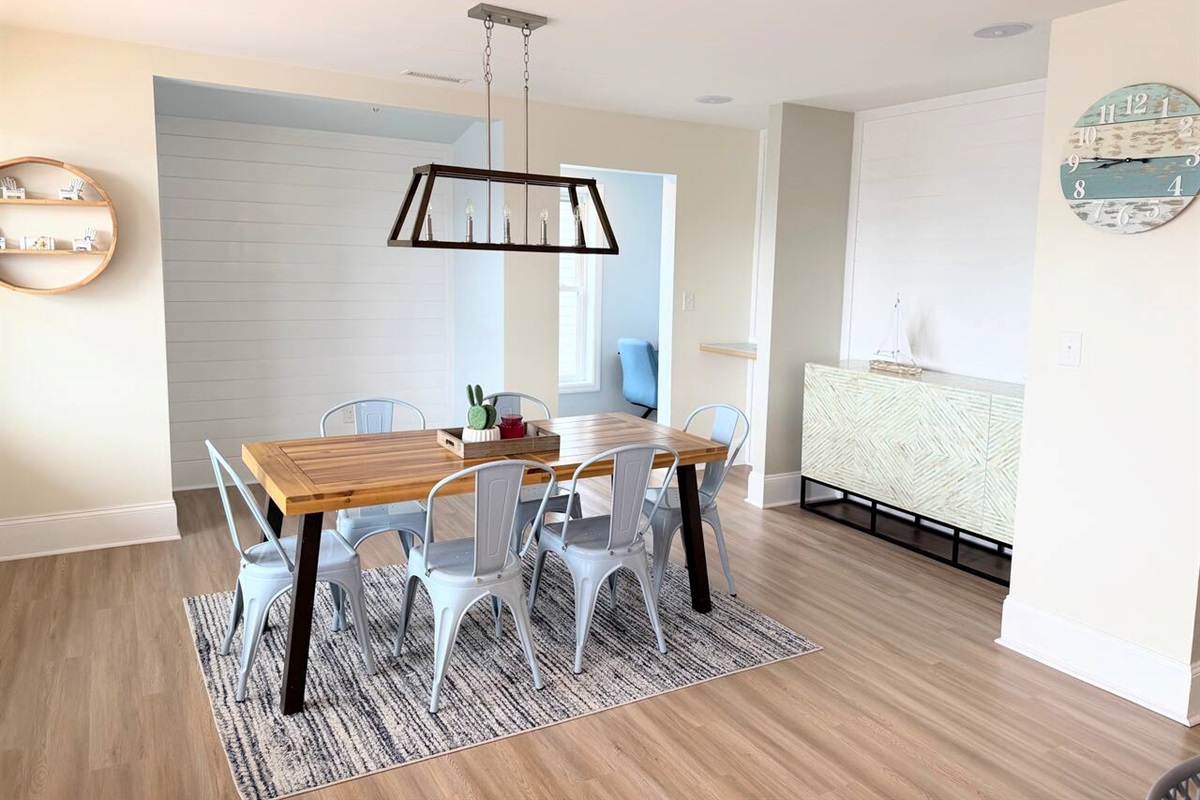 Dining room and designated work area with office chair