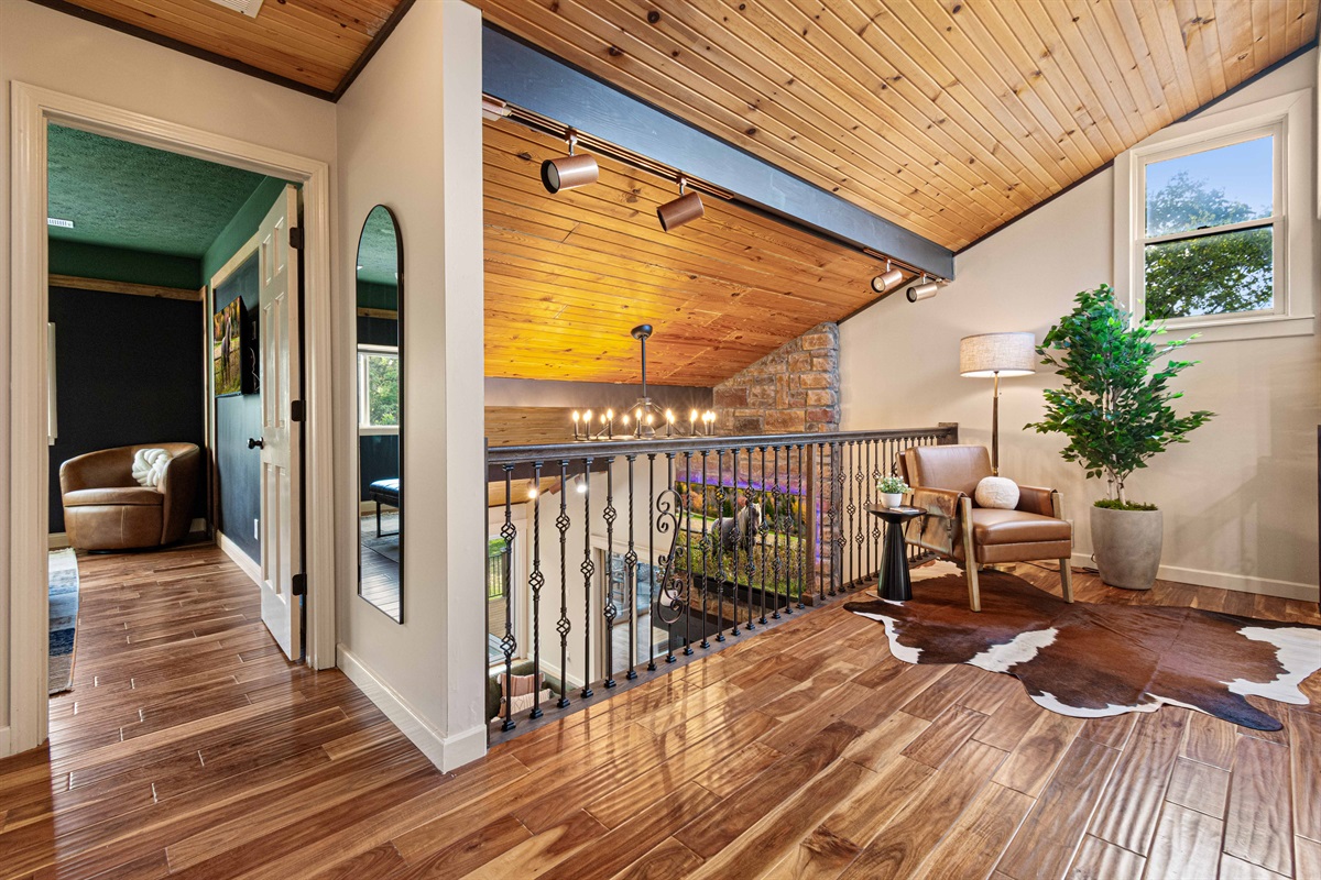 The upstairs loft area between bedrooms #1 and #2 is a perfect quiet place to read a book or enjoy your morning coffee.