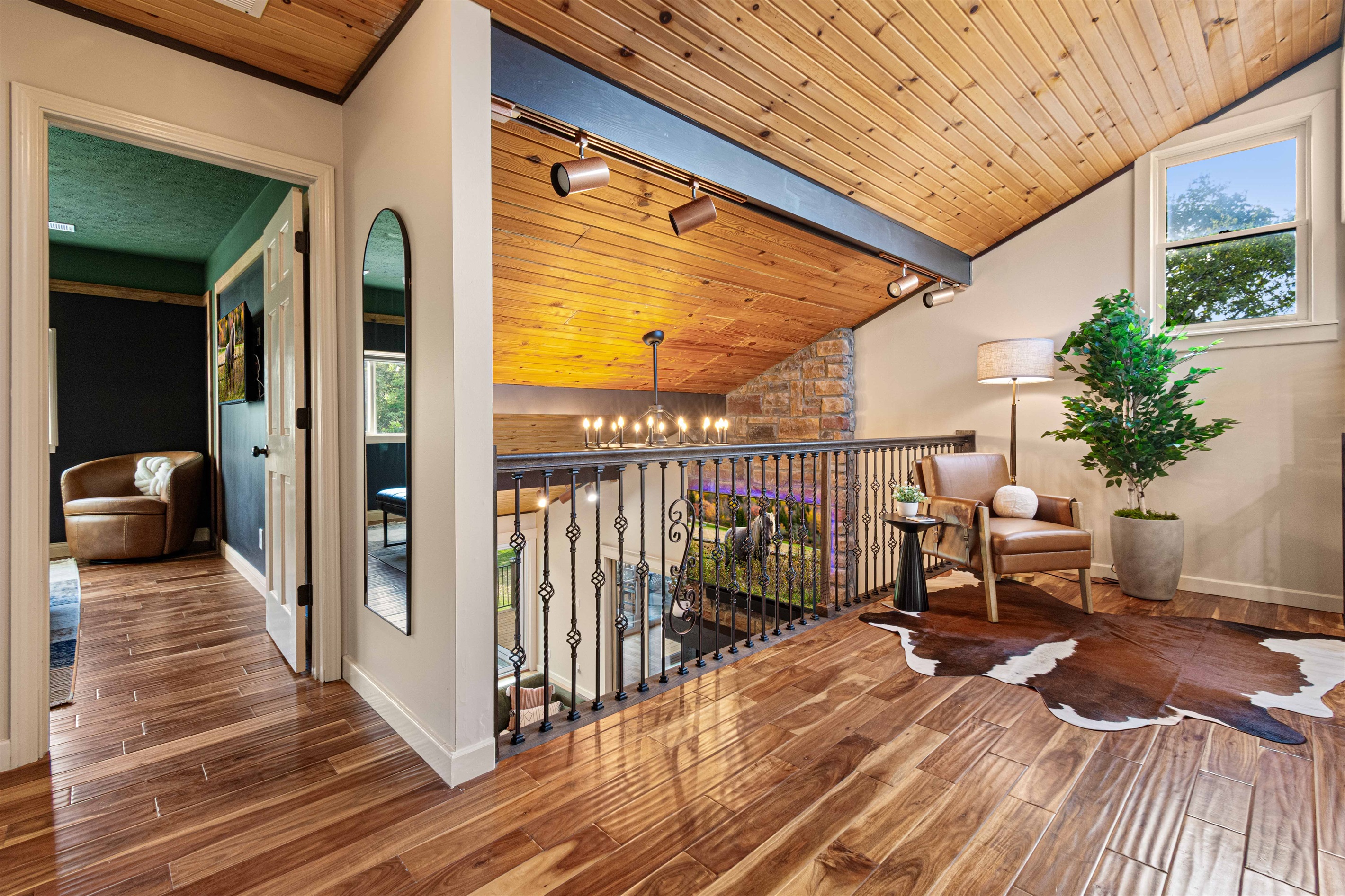 The upstairs loft area between bedrooms #1 and #2 is a perfect quiet place to read a book or enjoy your morning coffee.